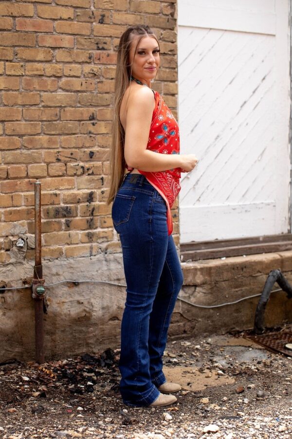 a girl in a Denim bootcut Jeans with Stitched at the bottom