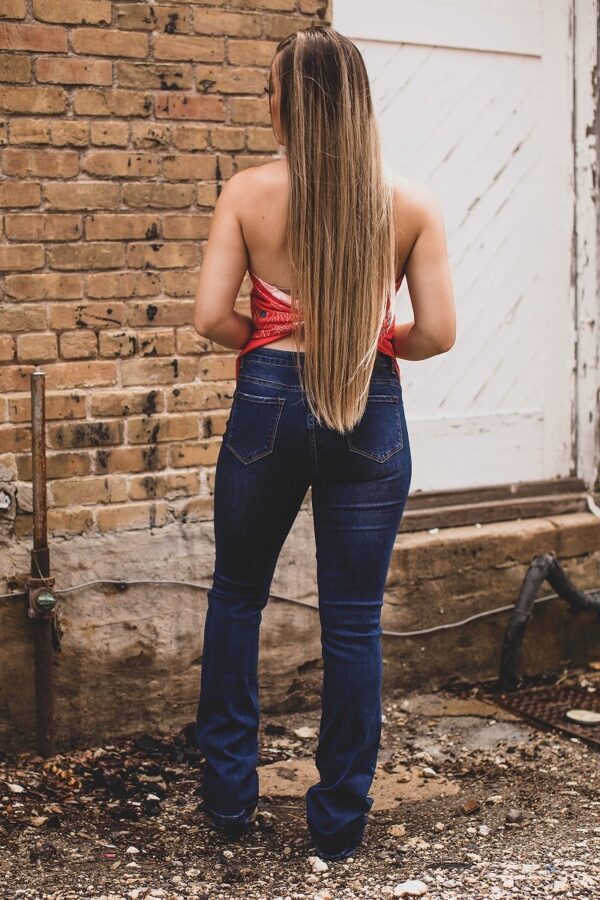 Back of a Denim bootcut Jeans with Stitched at the bottom