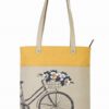 A large hand bag with a cycle printed on it